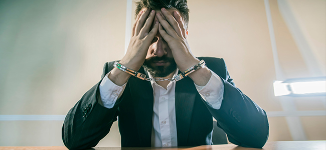 “Double Jeopardy” for Tax Evasion – Penalties plus Prosecution young pensive female in eyeglasses thinking of new creative ideas